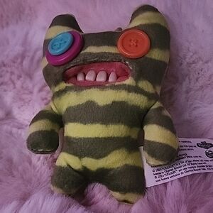 Fuggler ( Ralph) A Whimsical Striped Plush Creature with Button Eyes.